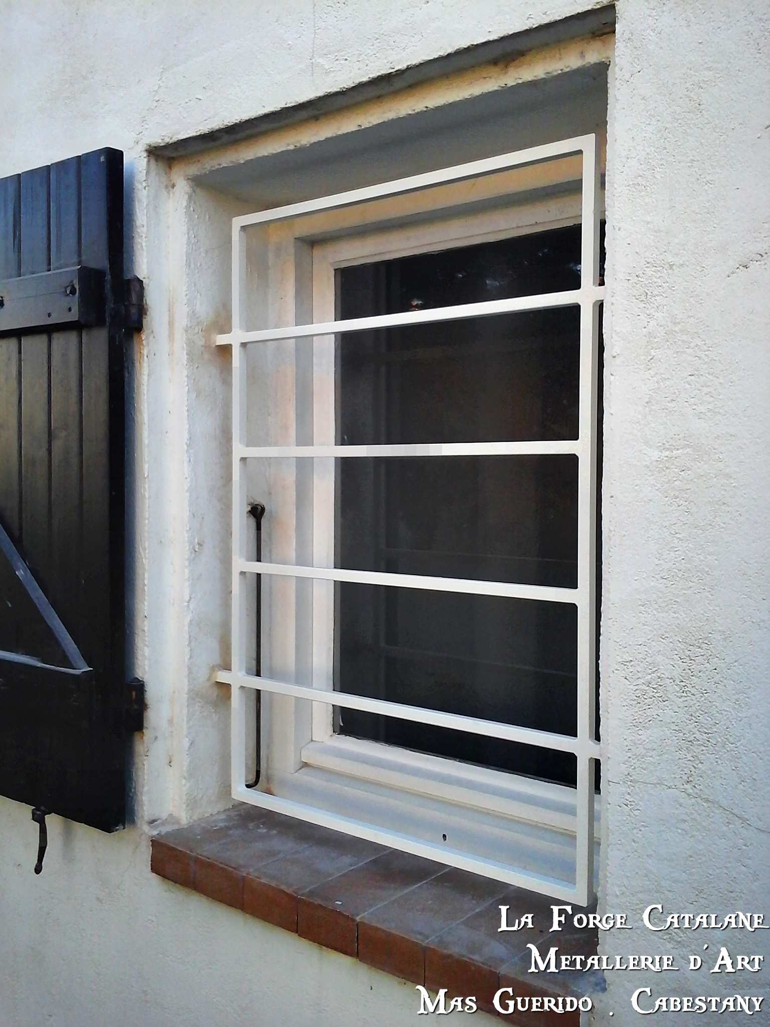 grille barreaudage horizontal fer plat forge catalane.jpg